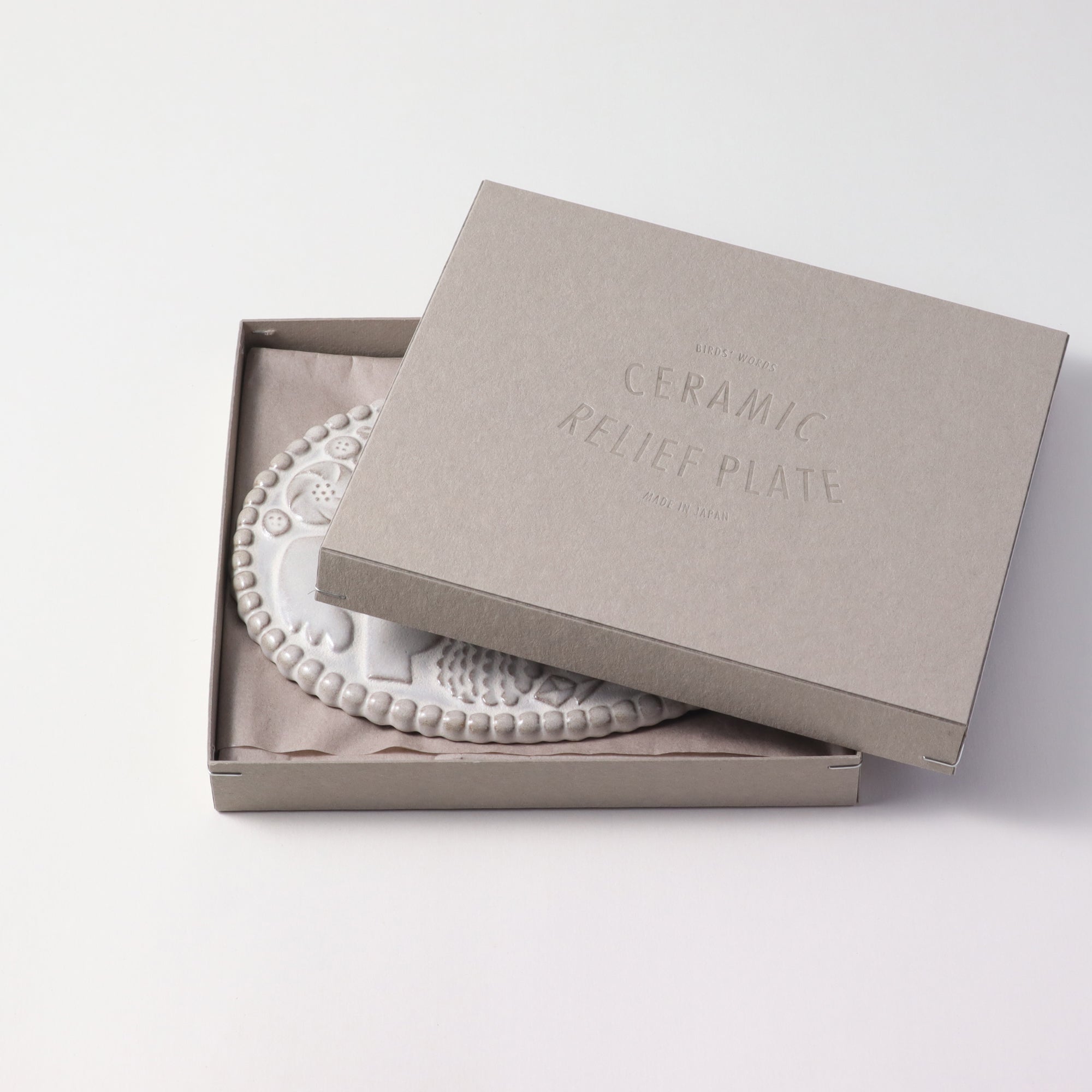 CERAMIC RELIEF PLATE / ELLIPSE – BIRDS' WORDS